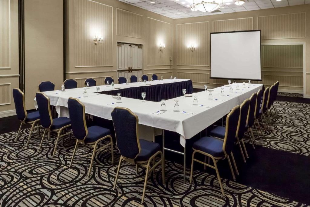 a large conference room with a long table and chairs at Wyndham Southbury in Southbury
