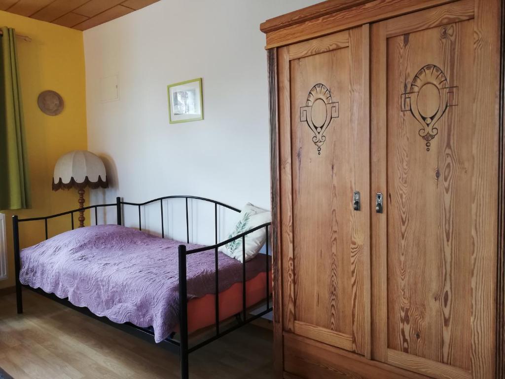 Postel nebo postele na pokoji v ubytování FeWo Gutendorf