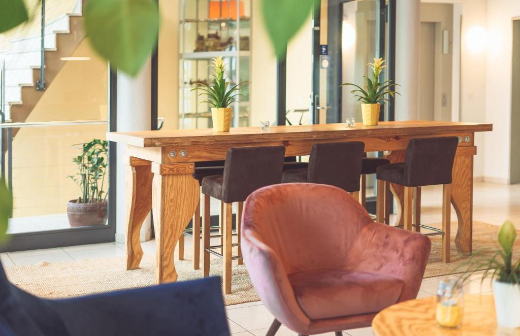 Posezení v ubytování Tailormade Hotel STANS SÜD
