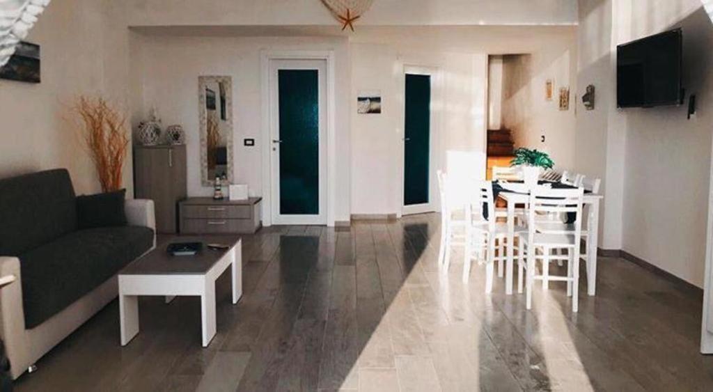A television and/or entertainment centre at Casa Caterina Deluxe Sorrento Coast
