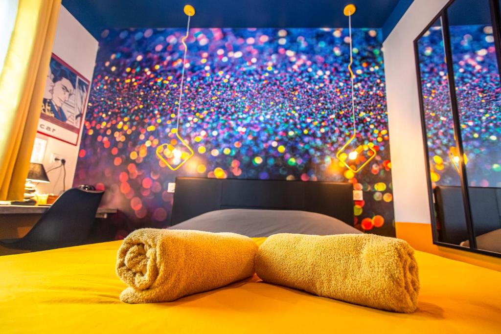 Postel nebo postele na pokoji v ubytování SMILE APPARTS - Appartements - Au coeur de Lorient - Au calme - Tout Confort