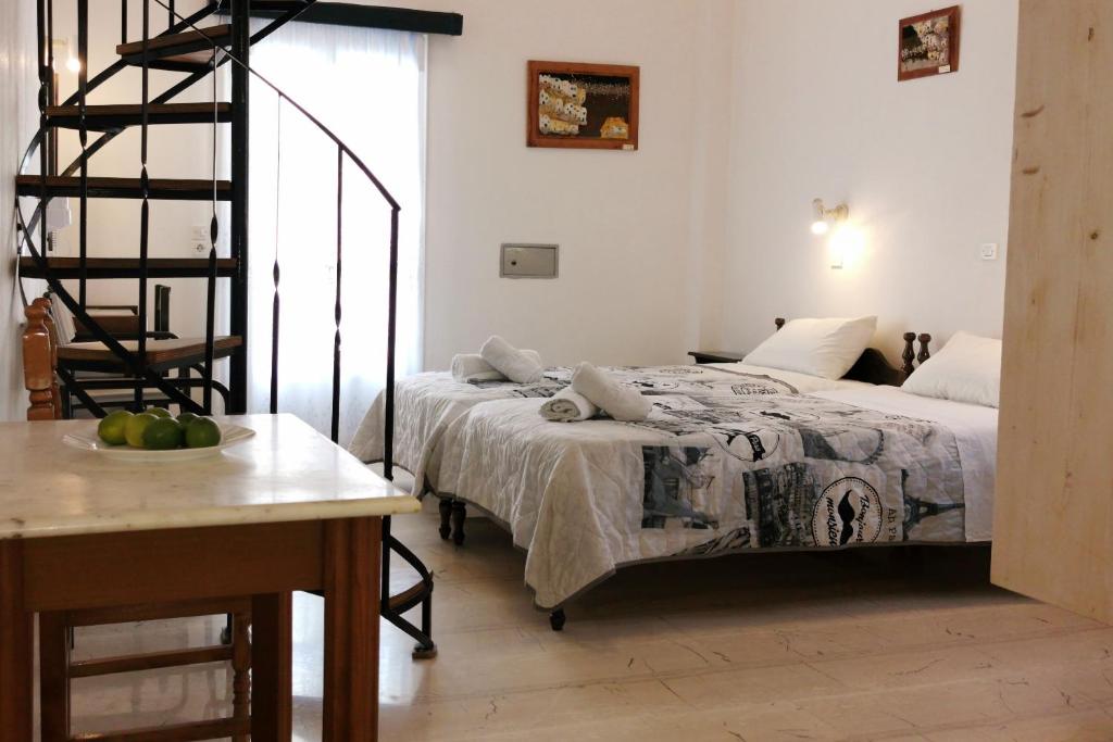 Letto o letti in una camera di Aretousa Villas