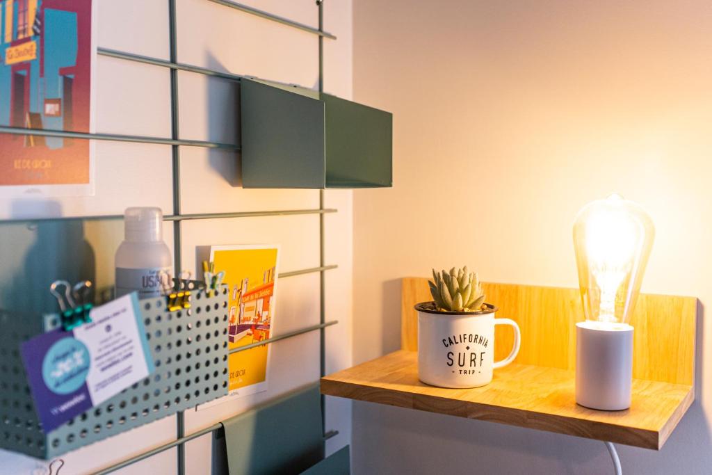 Kuchyň nebo kuchyňský kout v ubytování SMILE APPARTS - Appartements - Au coeur de Lorient - Au calme - Tout Confort