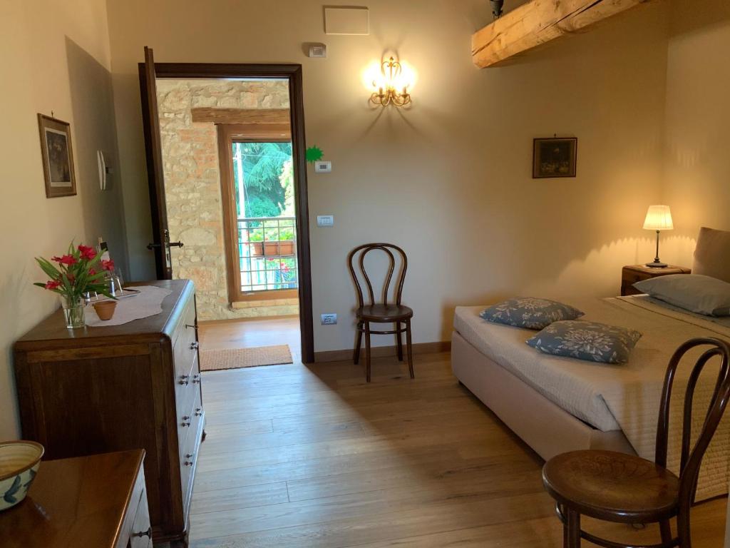 Postel nebo postele na pokoji v ubytování Borgo Palazzo Steffaneo
