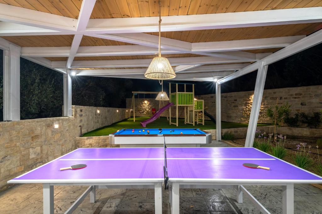 Stolní tenis v ubytování Olivia Villa, Celestial haven of luxury, By ThinkVilla nebo okolí