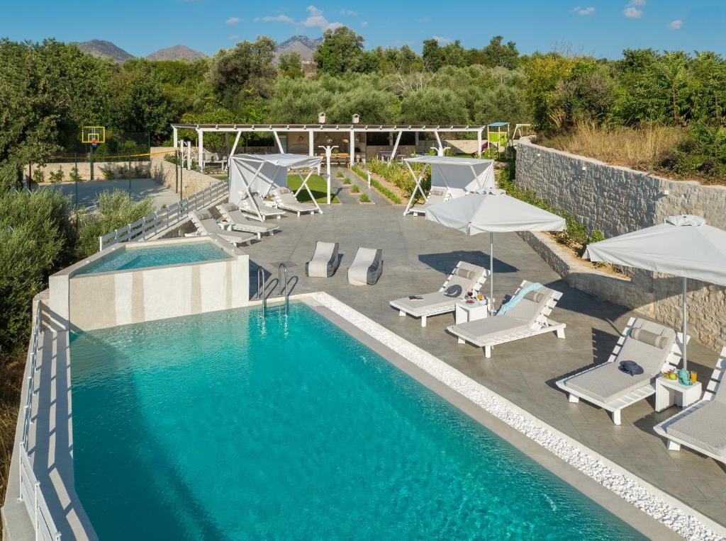 Bazén v ubytování Olivia Villa, Celestial haven of luxury, By ThinkVilla nebo v jeho okolí