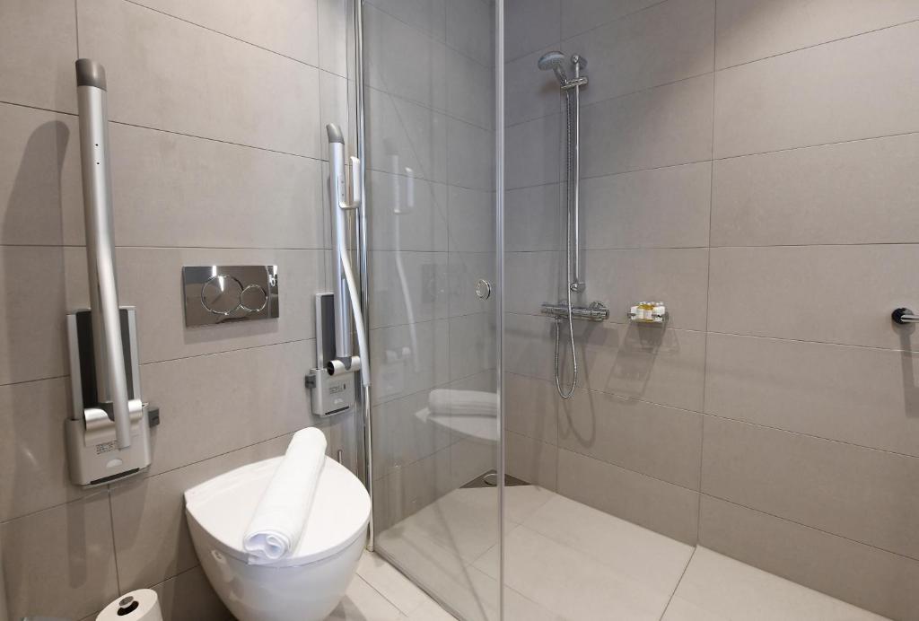 Koupelna v ubytování Best Western Plus Grow Hotel