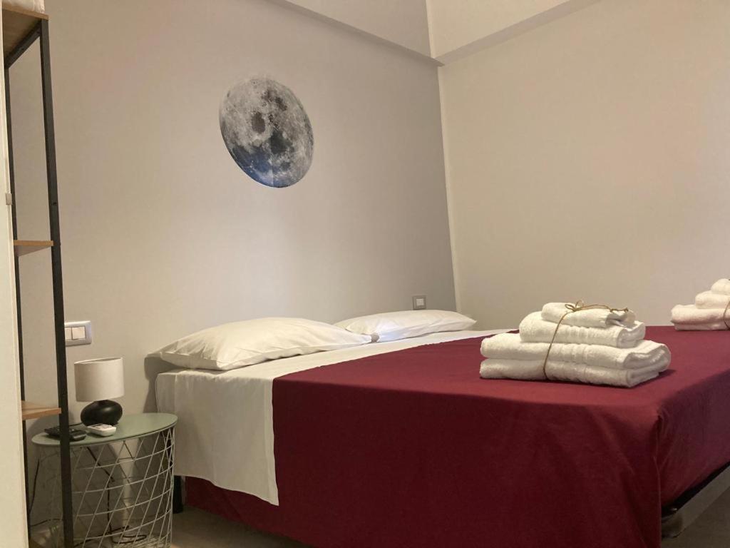 Posteľ alebo postele v izbe v ubytovaní Gatto Bianco Picone 19