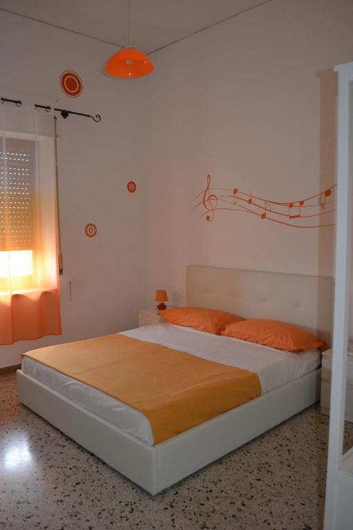 Postel nebo postele na pokoji v ubytování Sorrento Experience