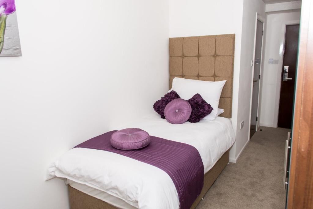 Postel nebo postele na pokoji v ubytování Parkview Residence