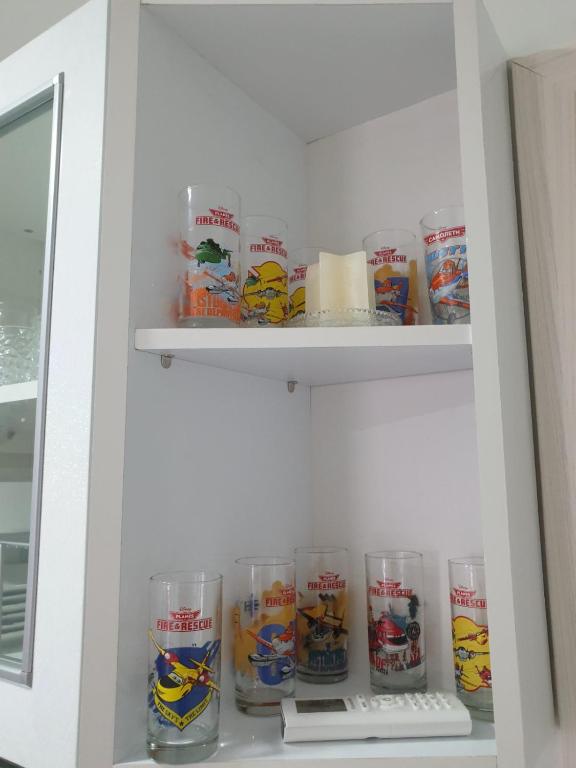 Kuchnia lub aneks kuchenny w obiekcie M & M White Luxury