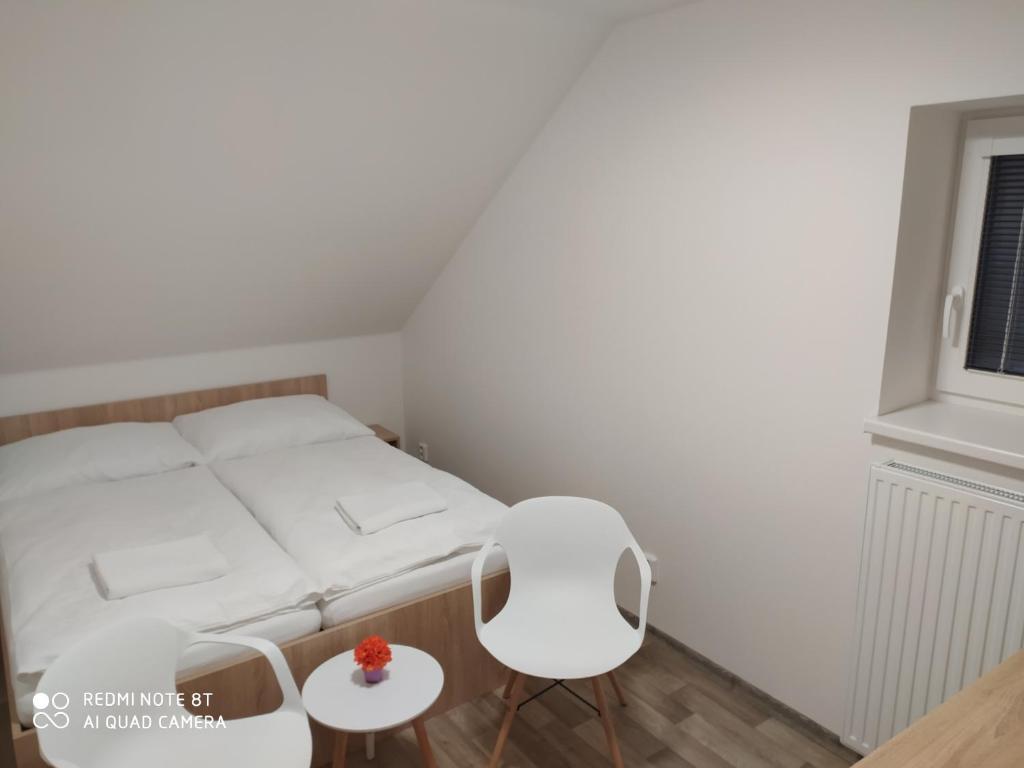 Postel nebo postele na pokoji v ubytování Apartmán u Davida