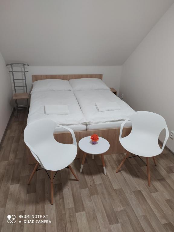 Postel nebo postele na pokoji v ubytování Apartmán u Davida