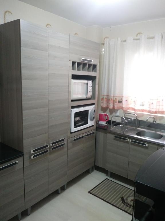  Apartamento com 02 Dormitórios bem mobiliado