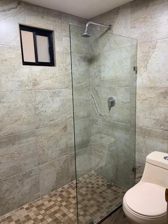 Koupelna v ubytování Hotel Adriana