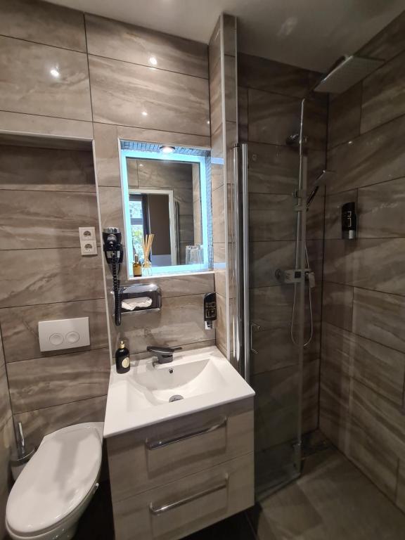 Koupelna v ubytování Urban Boutique Hotel