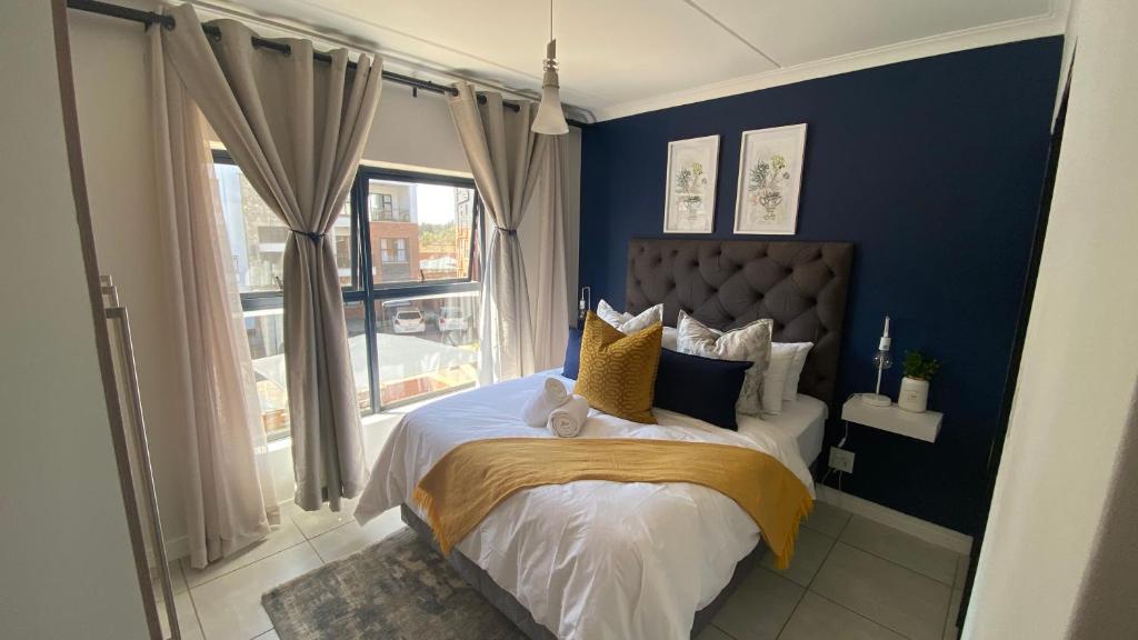 Postel nebo postele na pokoji v ubytování The Blyde - Unit 1136