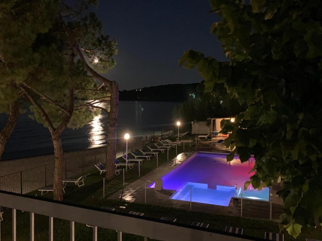 Bazén v ubytování Villaggio Turistico dei Tigli nebo v jeho okolí