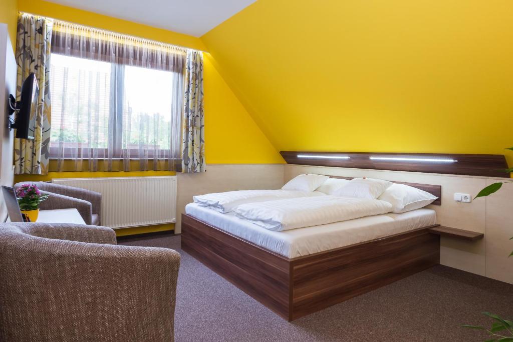 Hotel Mayer Alsóörsにあるベッド
