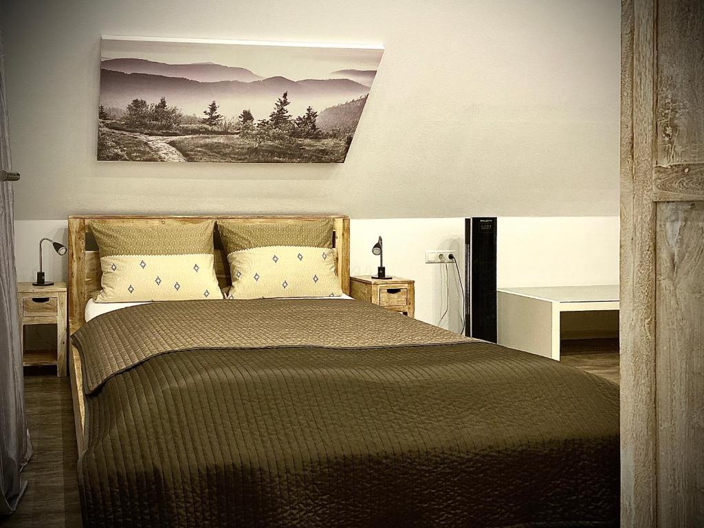 Postel nebo postele na pokoji v ubytování Dilger Apartments