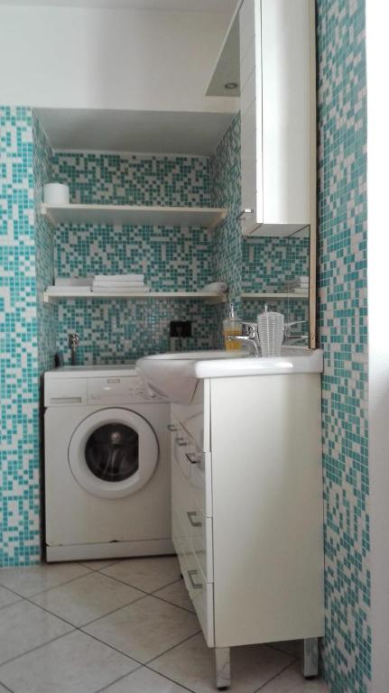 Kuchyň nebo kuchyňský kout v ubytování Appartamento Le Cascate
