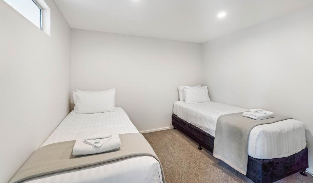 Postel nebo postele na pokoji v ubytování Kaikoura Beach Motel
