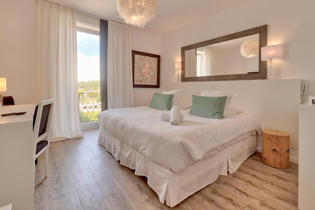Postel nebo postele na pokoji v ubytování Belfry & Spa by Ligne St Barth