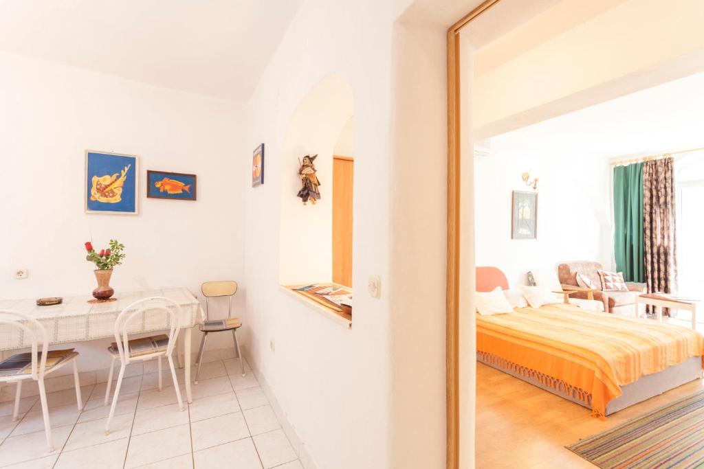 Postel nebo postele na pokoji v ubytování Green garden Rooms & Apartments