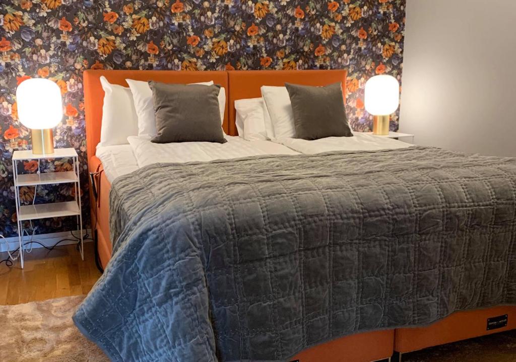Postel nebo postele na pokoji v ubytování Hotell Ronja