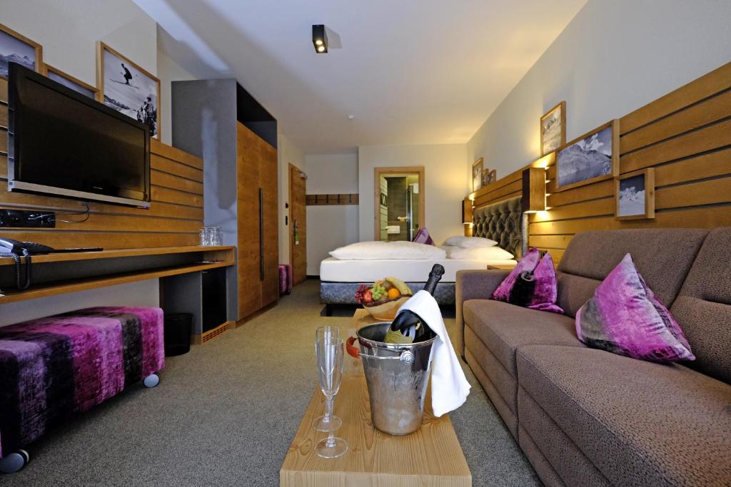 TV a/nebo společenská místnost v ubytování Hotel Vista Allegra