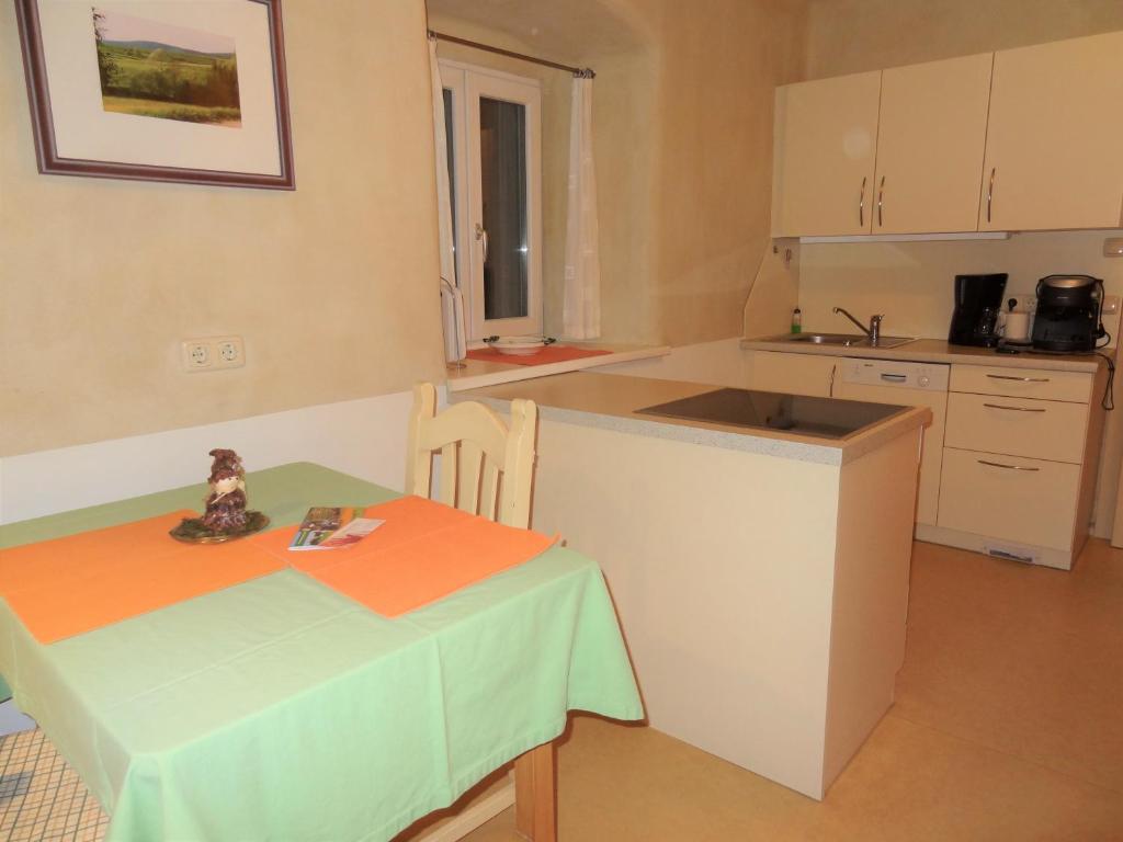 Kuchyň nebo kuchyňský kout v ubytování Ferienwohnung Veit