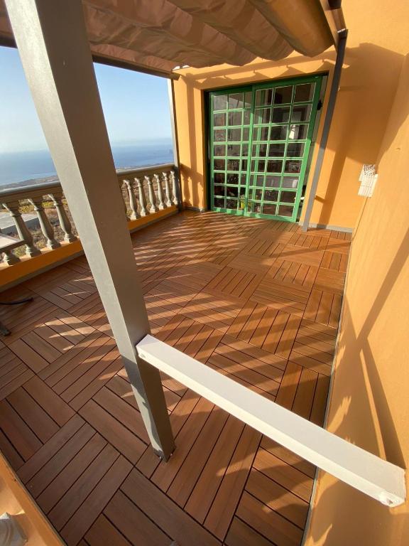 a balcony with a view of the ocean at Hotel Ida Inés in Frontera
