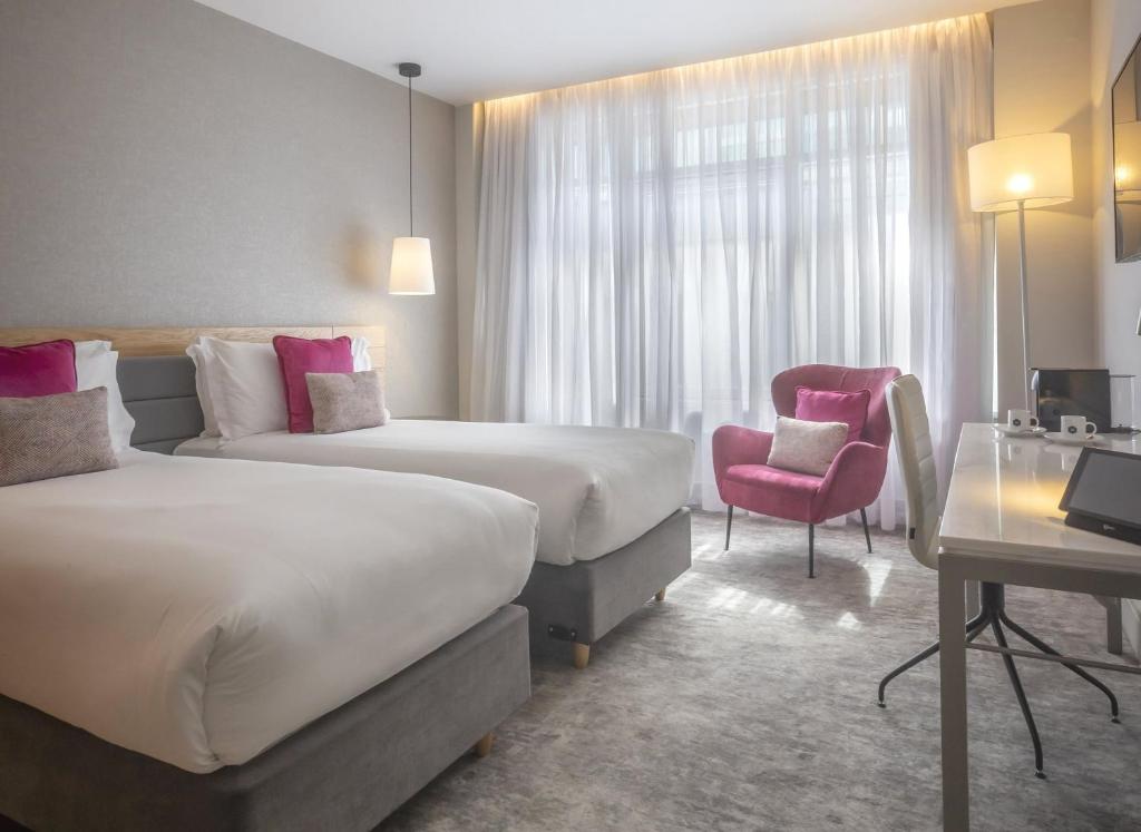 Postel nebo postele na pokoji v ubytování The Morgan Hotel