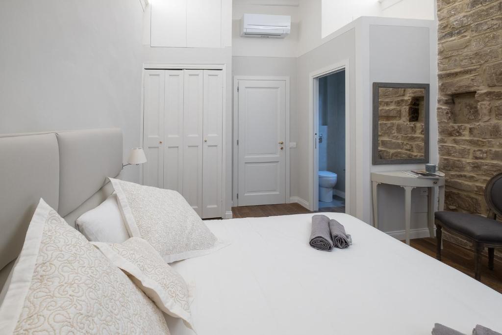 Posteľ alebo postele v izbe v ubytovaní Casini’s house