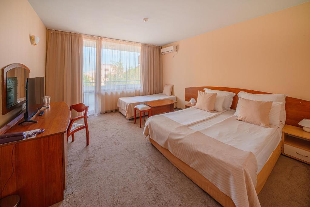 Postel nebo postele na pokoji v ubytování Perla Plaza Hotel - All Inclusive