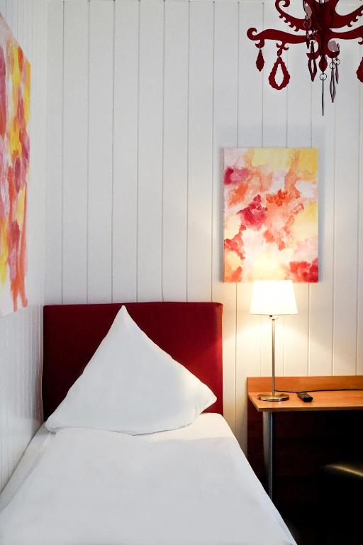 Postel nebo postele na pokoji v ubytování Hotel im Kupferkessel