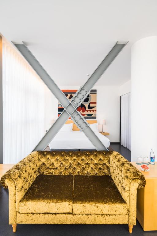 Uma área de estar em Boticas Hotel Art & SPA