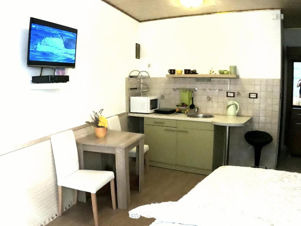 Apartment Tarita tesisinde mutfak veya mini mutfak
