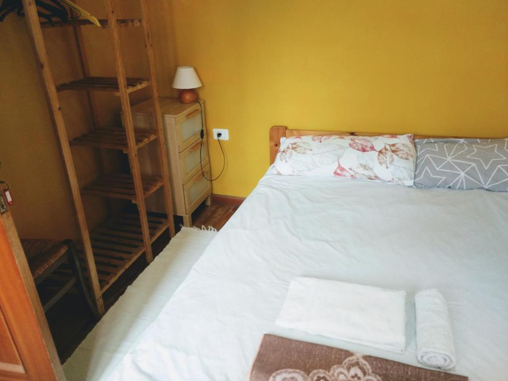 Postel nebo postele na pokoji v ubytování Hostel Tenerife