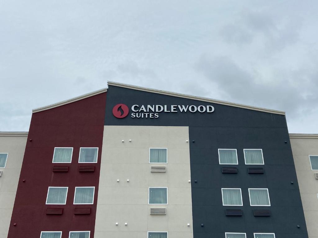 a building with a sign on the top of it at Candlewood Suites La Porte, an IHG Hotel in La Porte