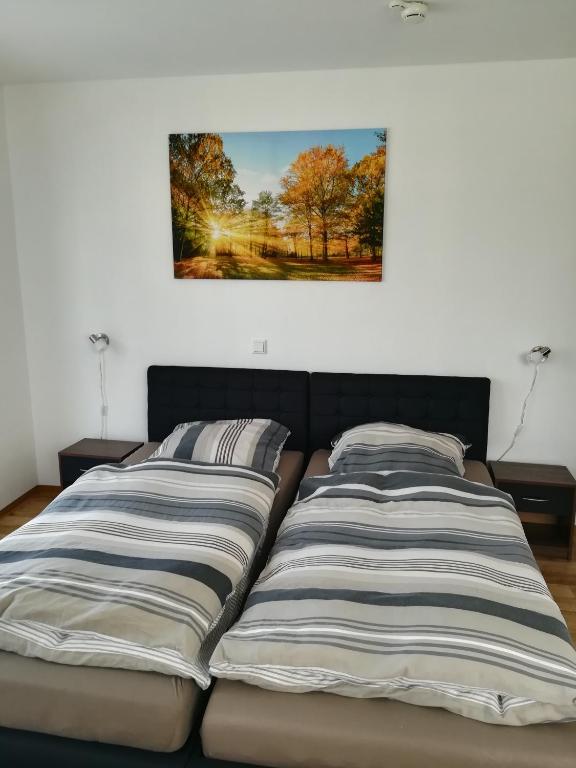 Postel nebo postele na pokoji v ubytování Jura Hotel