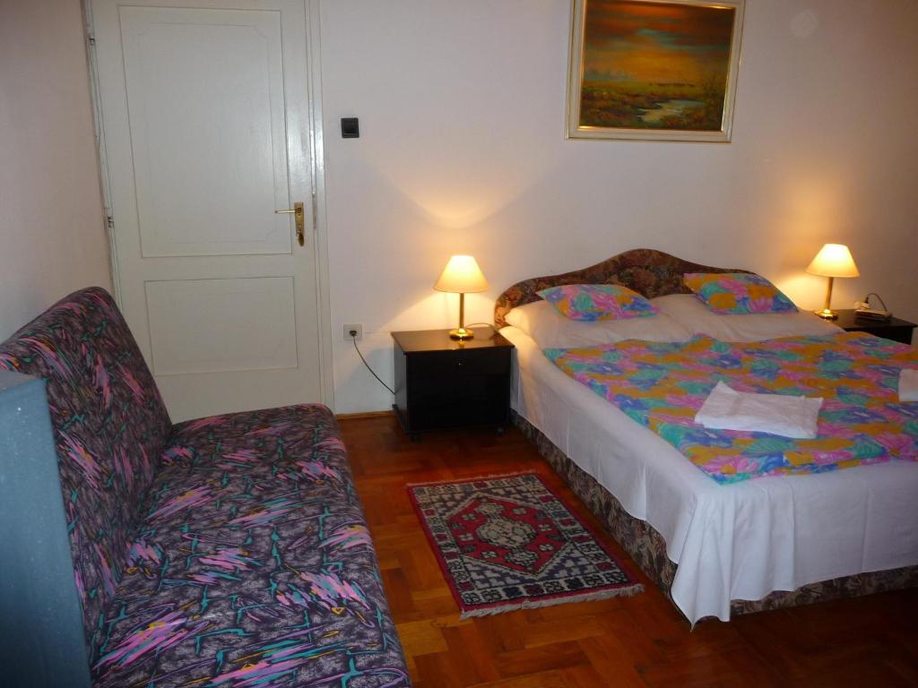 Postel nebo postele na pokoji v ubytování Oleander B&B