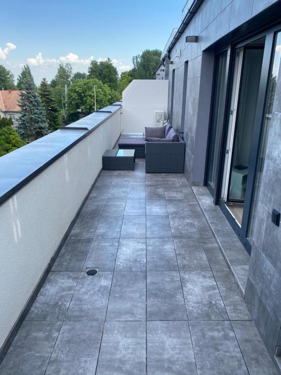 Balkón alebo terasa v ubytovaní Aranyhíd Apartman Balatonalmádi