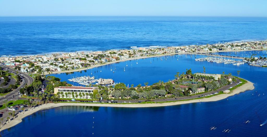 an aerial view of a resort with boats in a harbor at Bahia Resort Hotel in San Diego