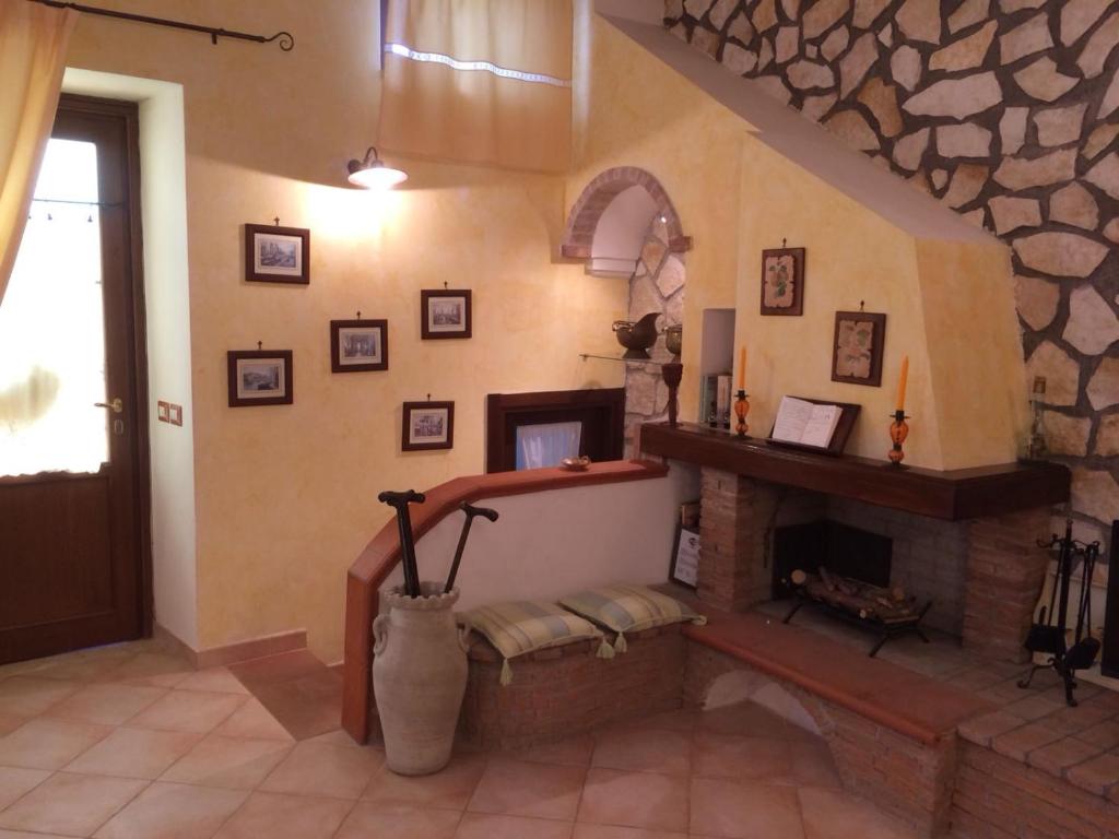 A seating area at Residenza Antico Borgo del Pozzo