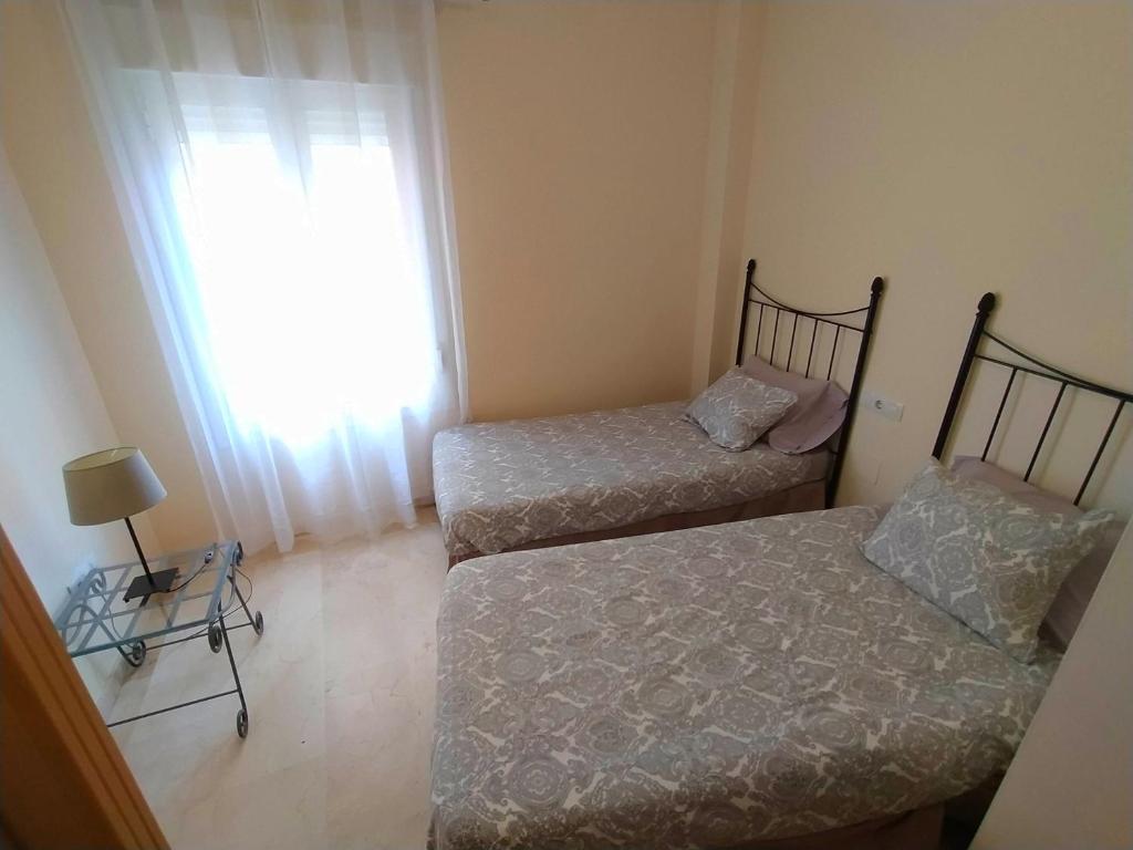 Posteľ alebo postele v izbe v ubytovaní Refugio del Sol 59