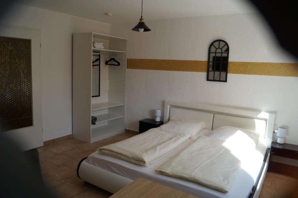 Postel nebo postele na pokoji v ubytování La Fontana