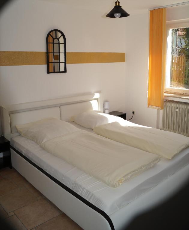 Postel nebo postele na pokoji v ubytování La Fontana