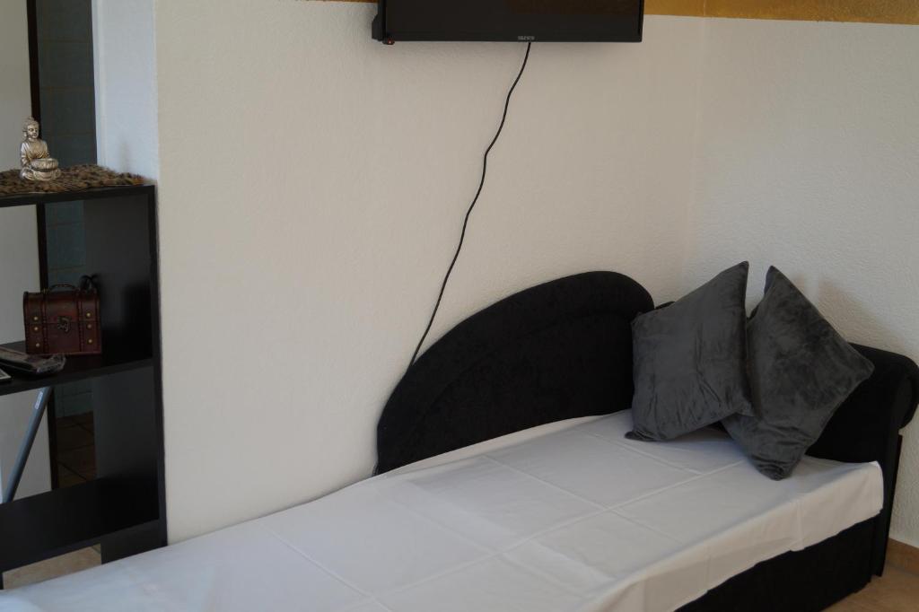 Postel nebo postele na pokoji v ubytování La Fontana