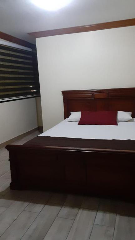 Postel nebo postele na pokoji v ubytování Hotel Fika Guayaquil